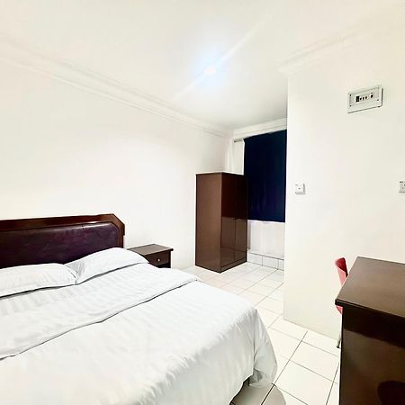Oyo 91033 Vaigan Hotel Бинтулу Экстерьер фото