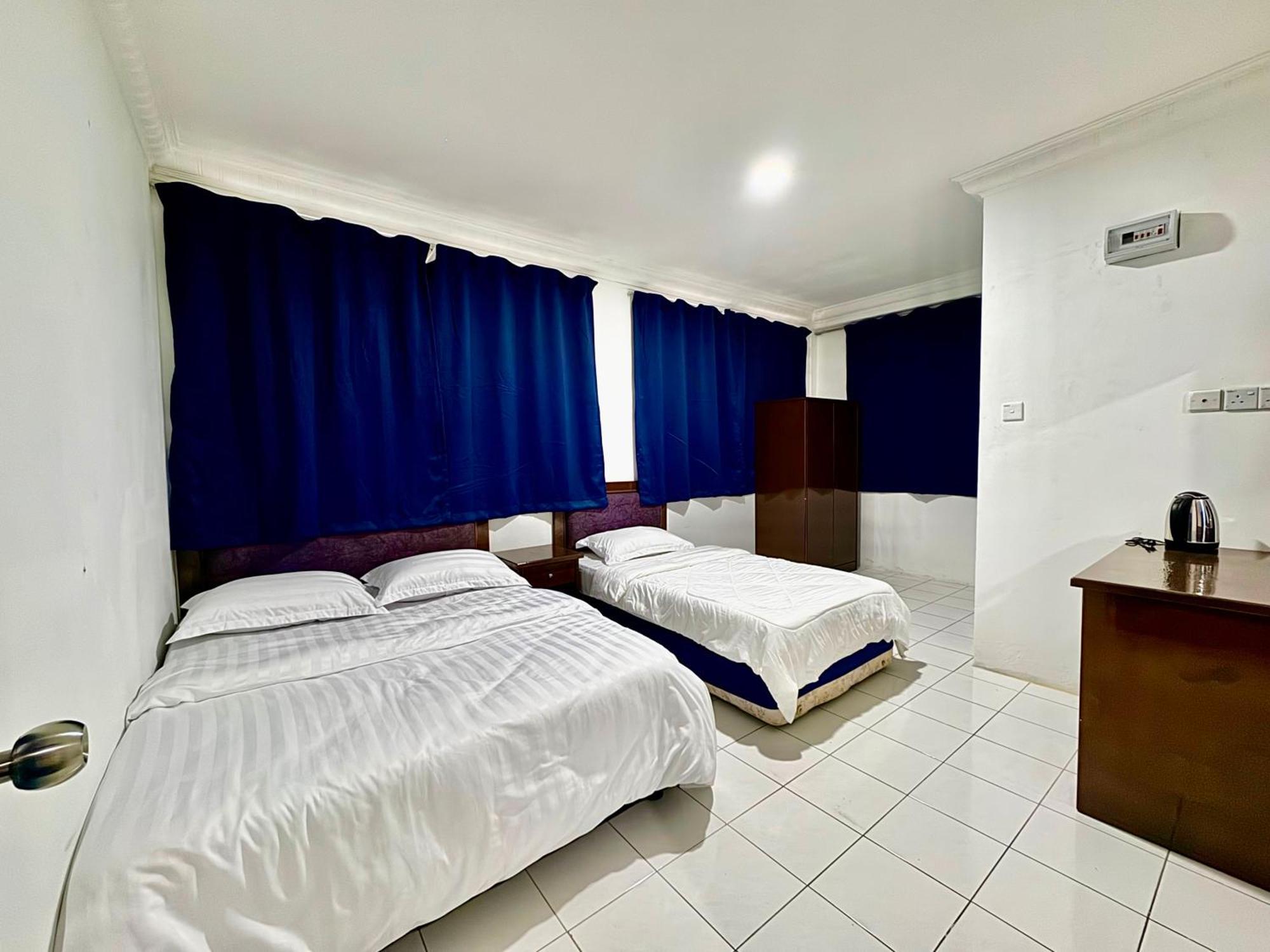 Oyo 91033 Vaigan Hotel Бинтулу Экстерьер фото
