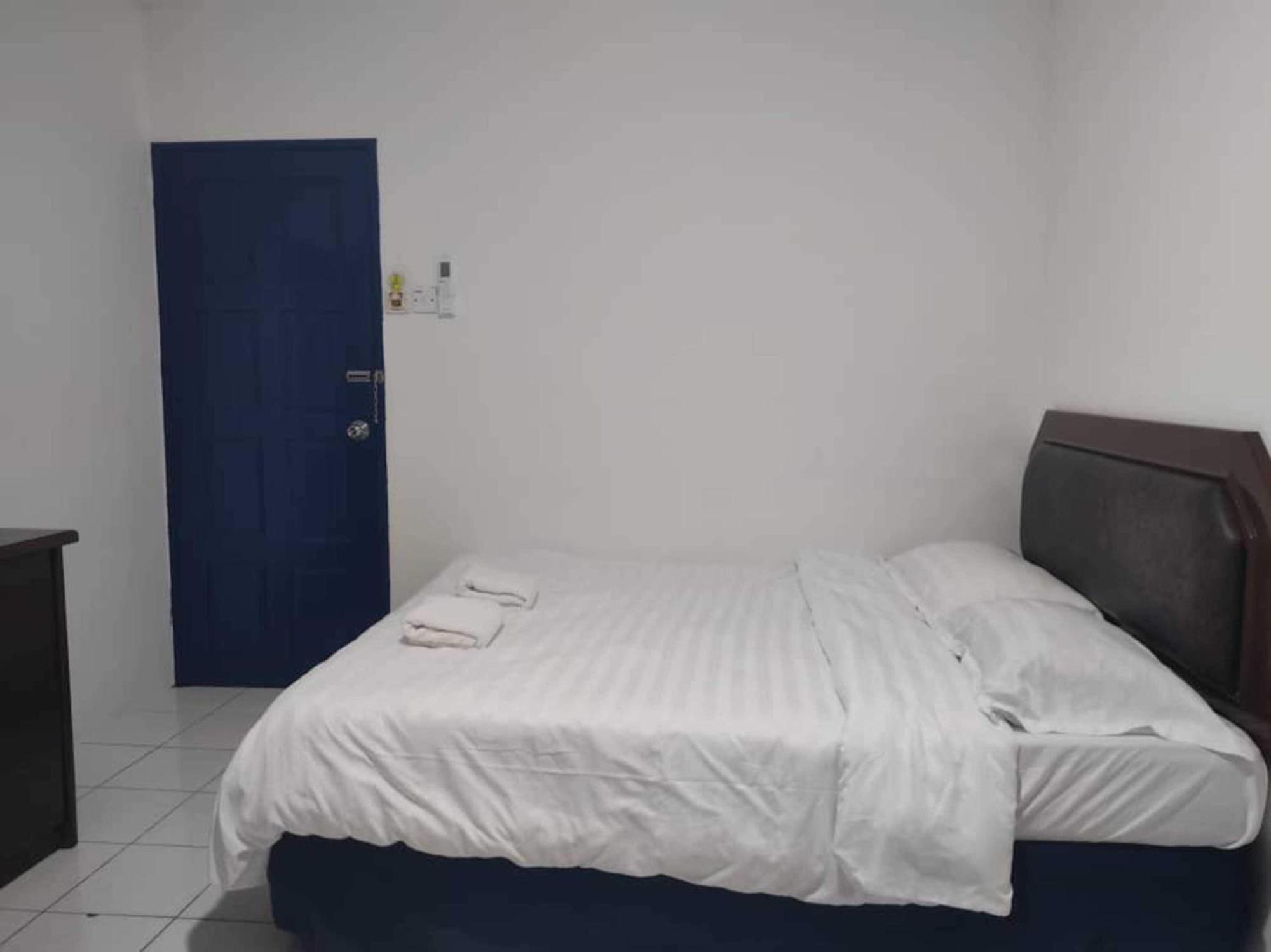 Oyo 91033 Vaigan Hotel Бинтулу Экстерьер фото
