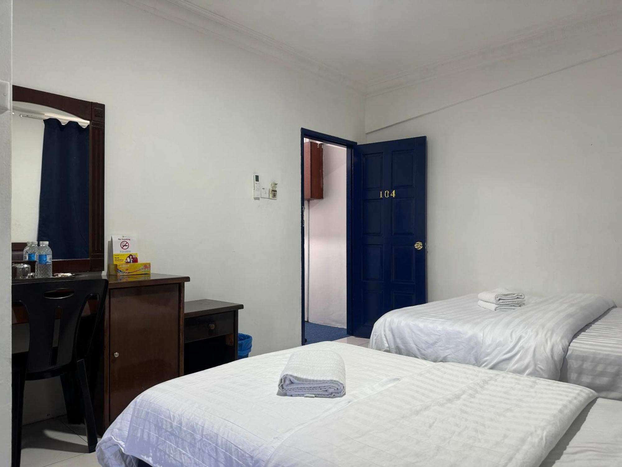 Oyo 91033 Vaigan Hotel Бинтулу Экстерьер фото